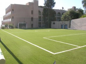 Construction of soccer field with artificial turf