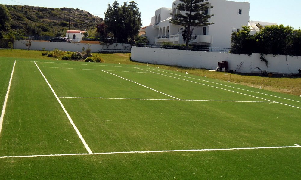 Tennis court with artificial turf ITF