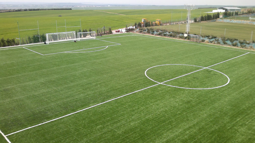 Construction of soccer field with artificial turf